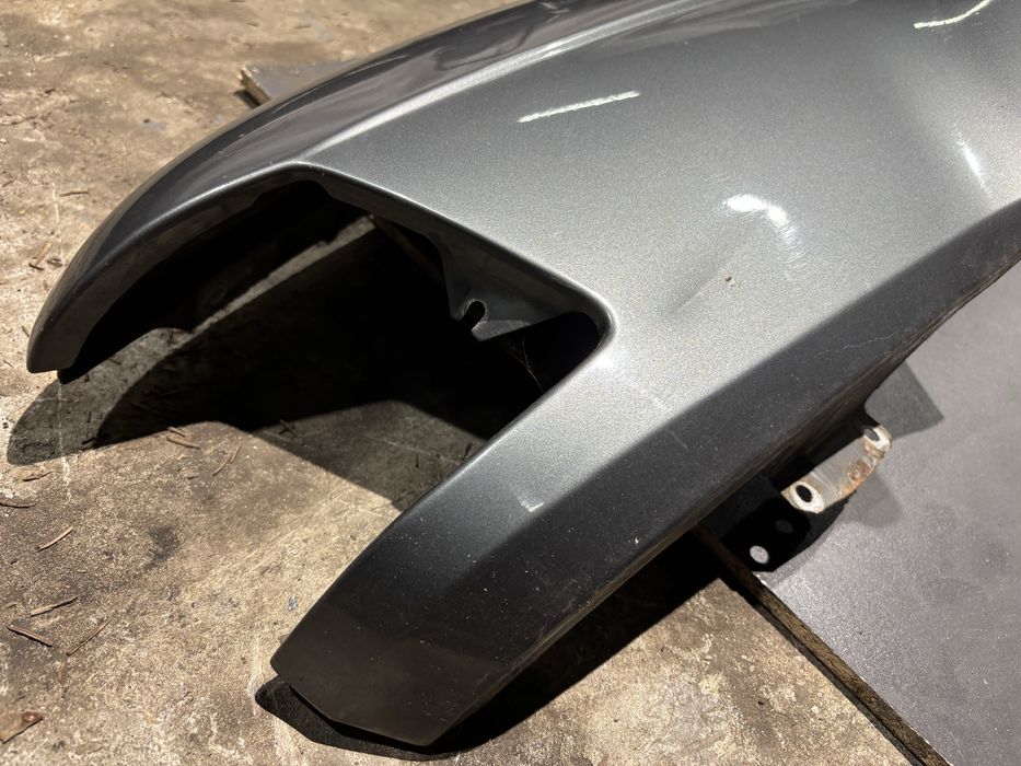 Błotnik lewy przód BMW E32 delphin