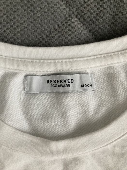 Biala bluzka z baskinką reserved