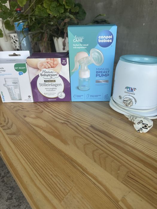 Молокоотсос, підігрівач, пакети для молока