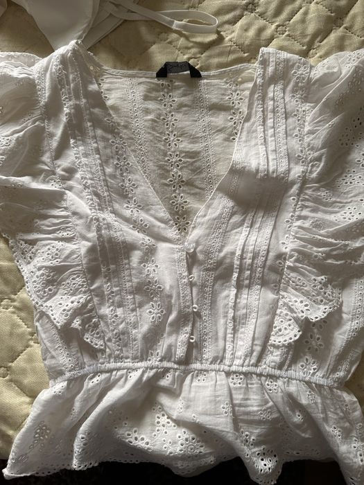 Camisolas brancas variadas