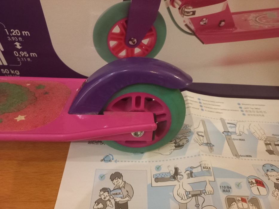 Trotinete rosa com travão mais caixa e manual