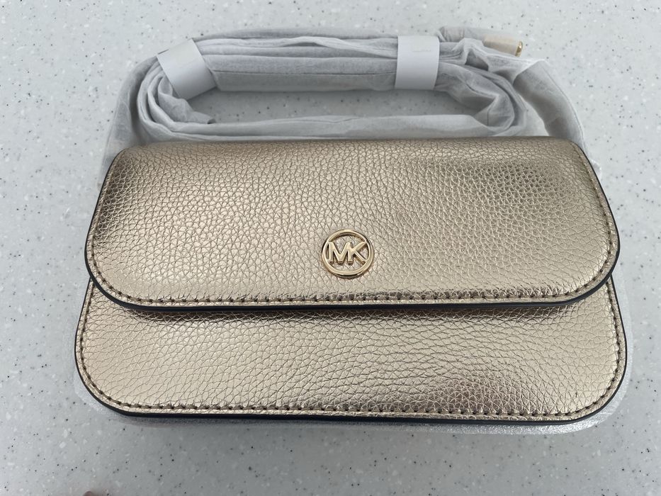 Нова сумка Michael Michael Kors Jet Set Travel, натуральна шкіра, колір pale gold, оригінал, є невеликий дефект.