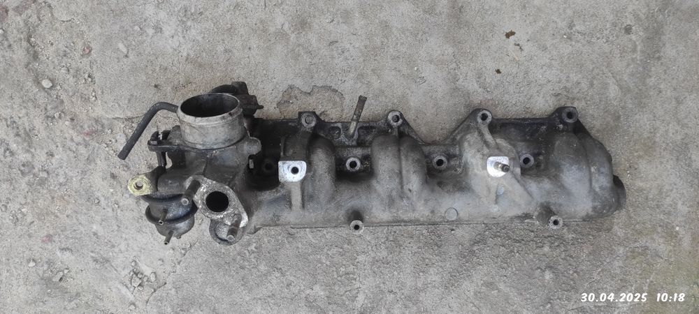 Впускний і випускний колектори Мазда диз.2.0 rf5c