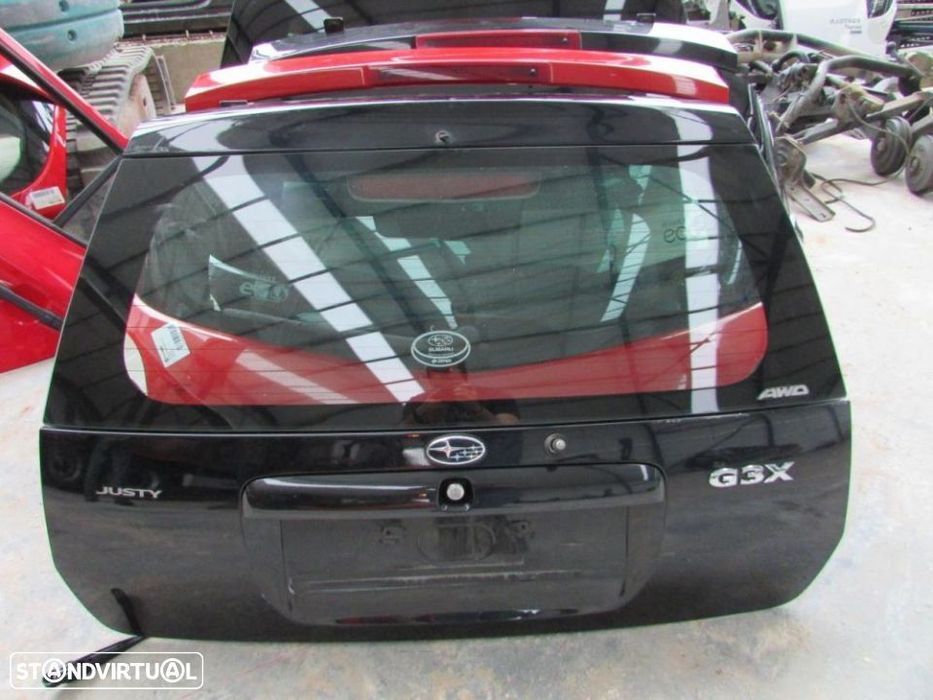 Tampa da mala Subaru Justy G3X