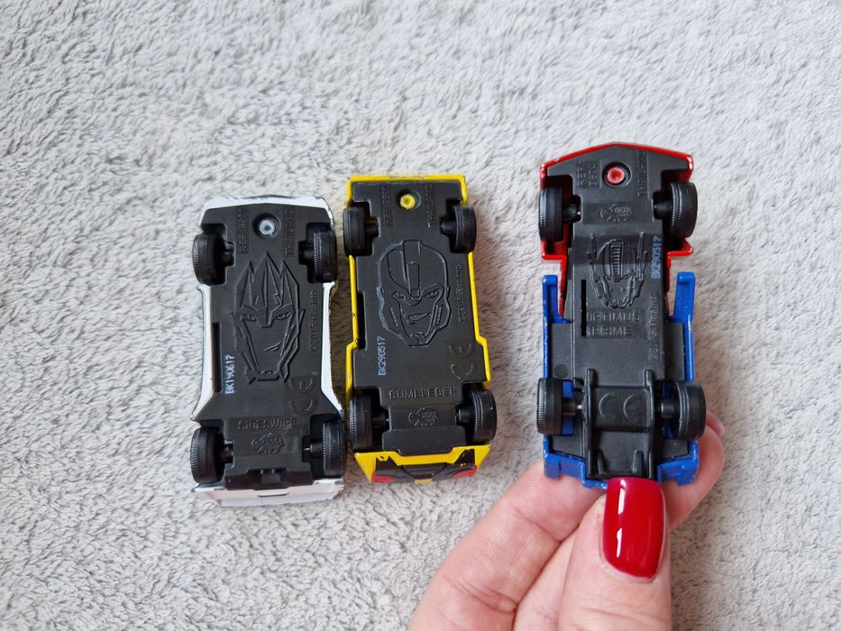 3 metalowe resoraki TRANSFORMERS + metalowy dinozaur