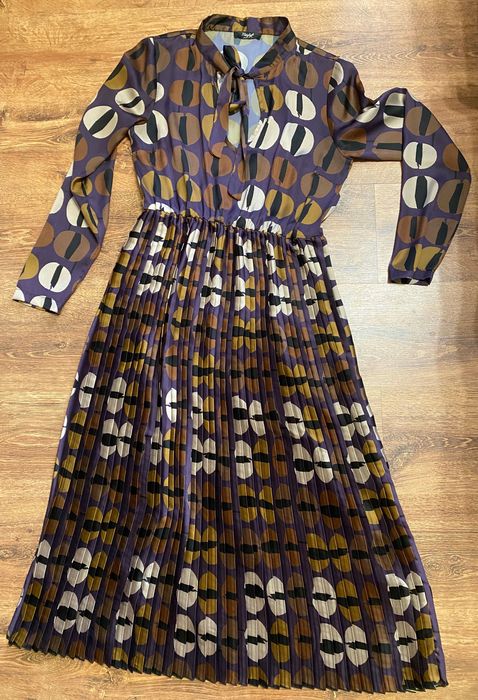 Elegancka midi suknia pastelowa geometryczna kokarda glamour vintage