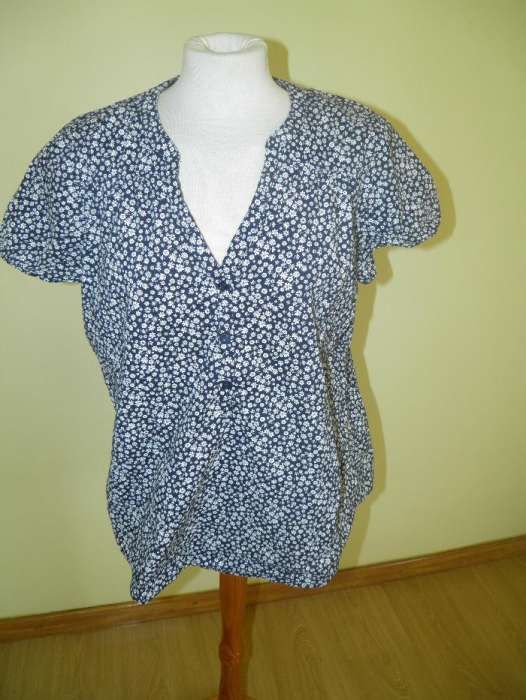 Camisa manga curta, muito feminina e confortável
