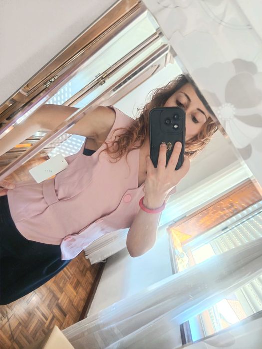 Colete rosa versátil