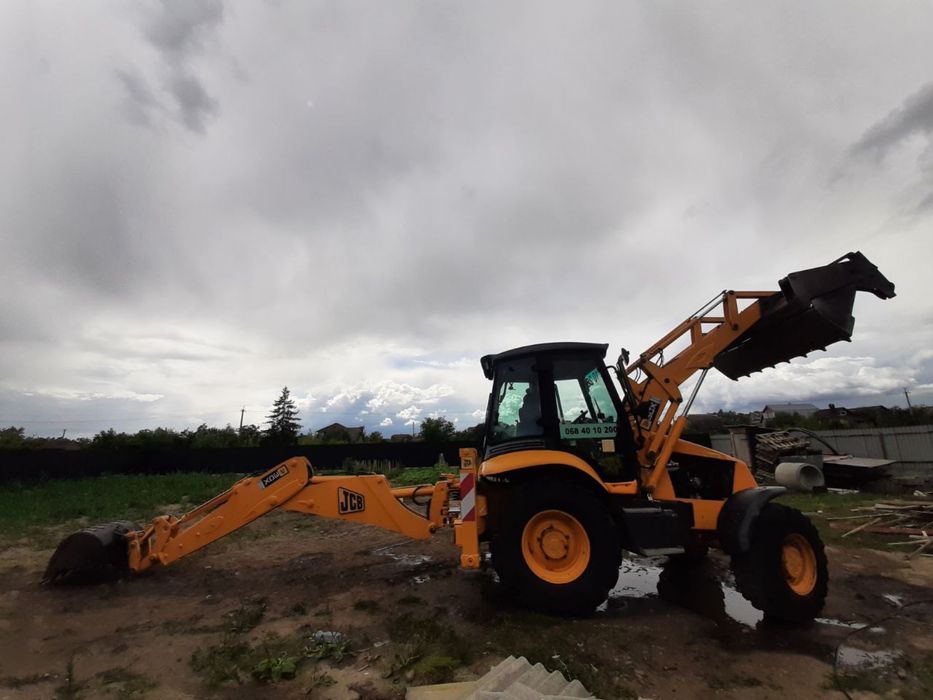 Послуги екскаватора-навантажувача. Оренда екскаватора погодинно.