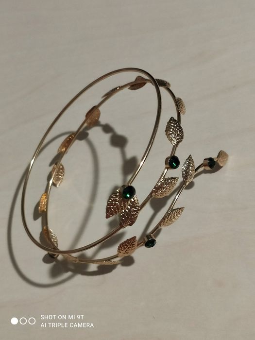 Спіральний браслет на плече (arm cuff).