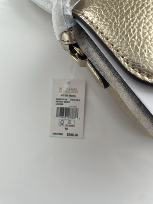 Нова сумка Michael Michael Kors Jet Set Travel, натуральна шкіра, колір pale gold, оригінал, є невеликий дефект.
