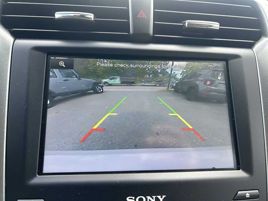 Ford Fusion Titanium Hybrid      2014