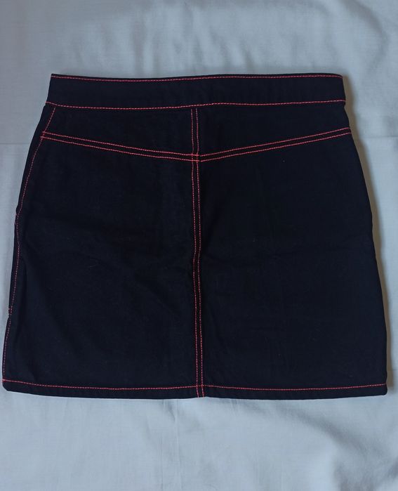 Mini saia preta com costuras neon S Denim Co