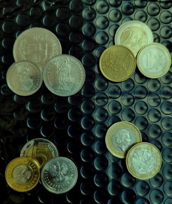 Монети євро, злотий