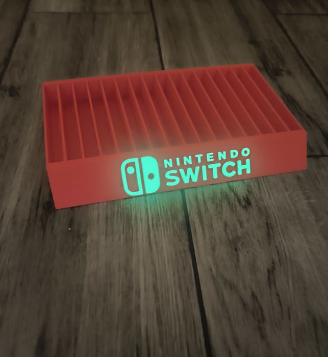Stojak podstawka na 16 gier Nintendo Switch napis fluorescencyjny