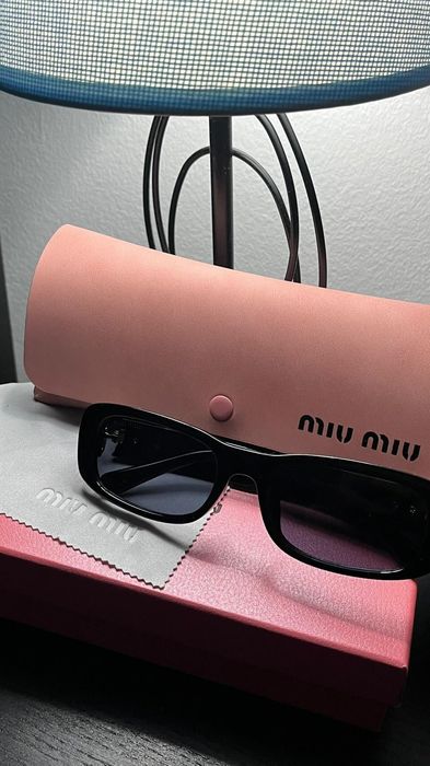 Óculos de sol miumiu