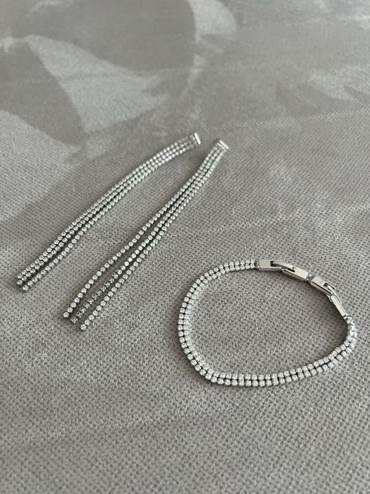 Сережки та браслет з камінцями