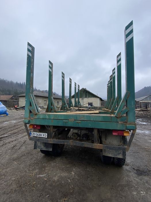 Продам прицеп лісовий урал камаз