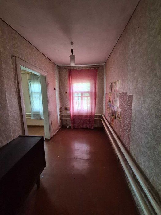 Продам 1\2 частина будинку м. Зміїв