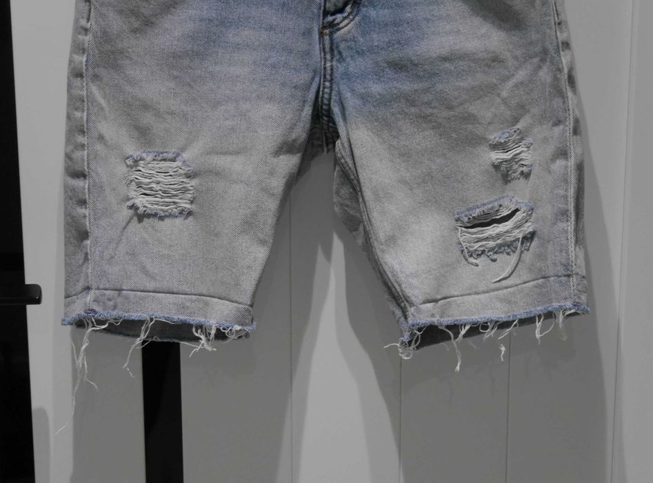 H&M świetne spodnie dziury 32 XXS
