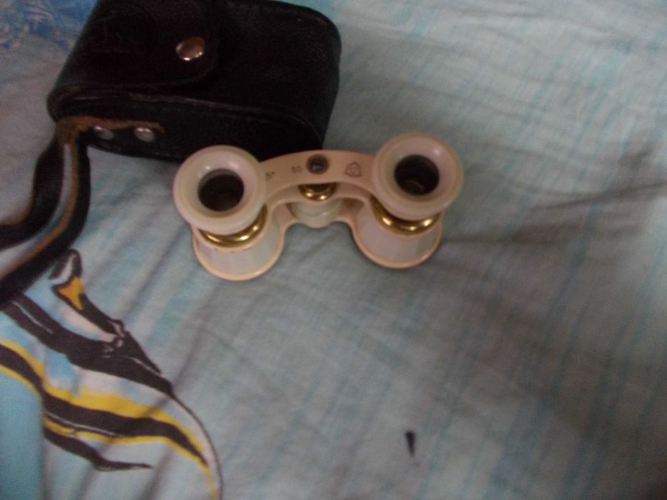 Бинокль театральный в хорошем состоянии,линзы без царапин.СССР.