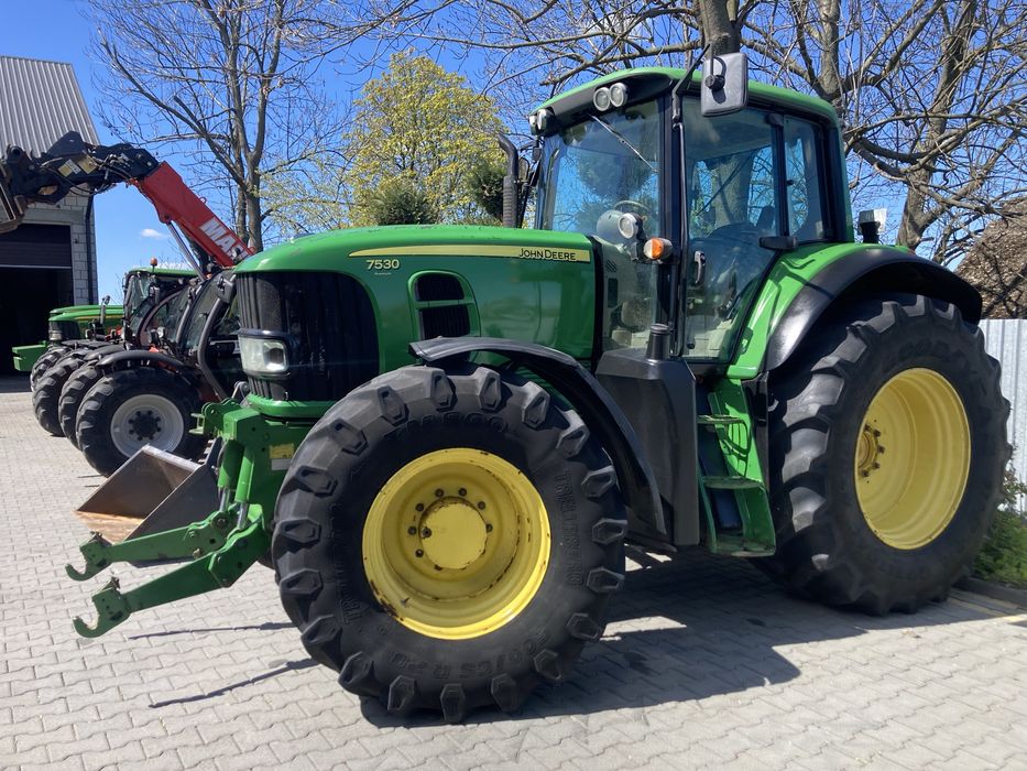 John  Deere. 7530 premium JD 7430
