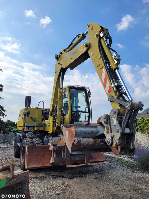 LIEBHERR 309 Klima, 4 łyżki + widły, Nowe opony! Kamera