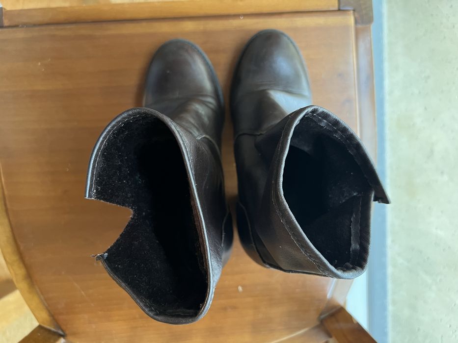 Botas em pele em excelente esrafo