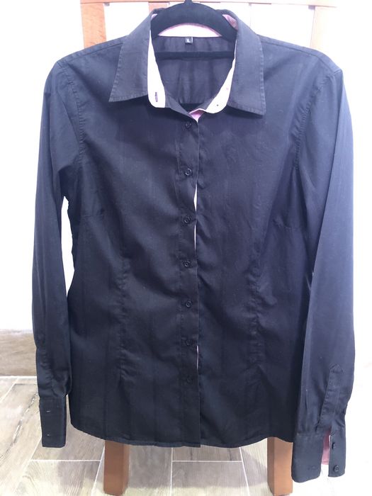 Camisa preta de mulher