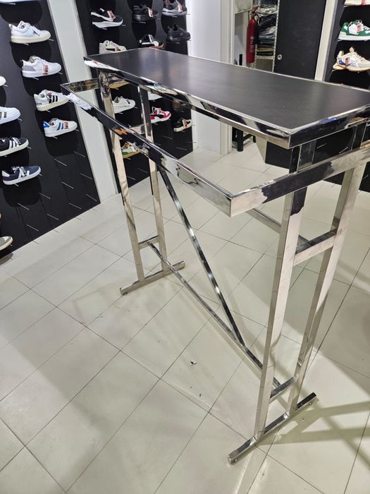 Expositor prateado para roupa