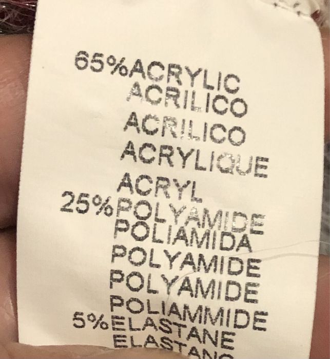 Poncho com mangas cavadas , franjas no final