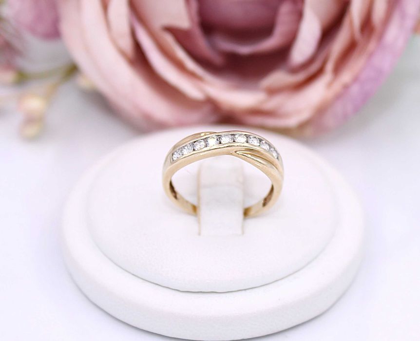 Złoty pierścionek p.375/1,80g  z cyrkoniami