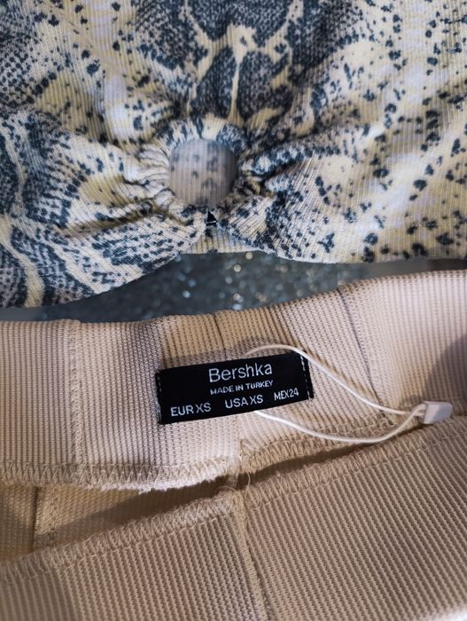 Spodnie Bershka kremowe flare