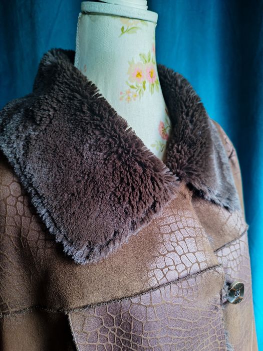 Casaco de imitação de pele