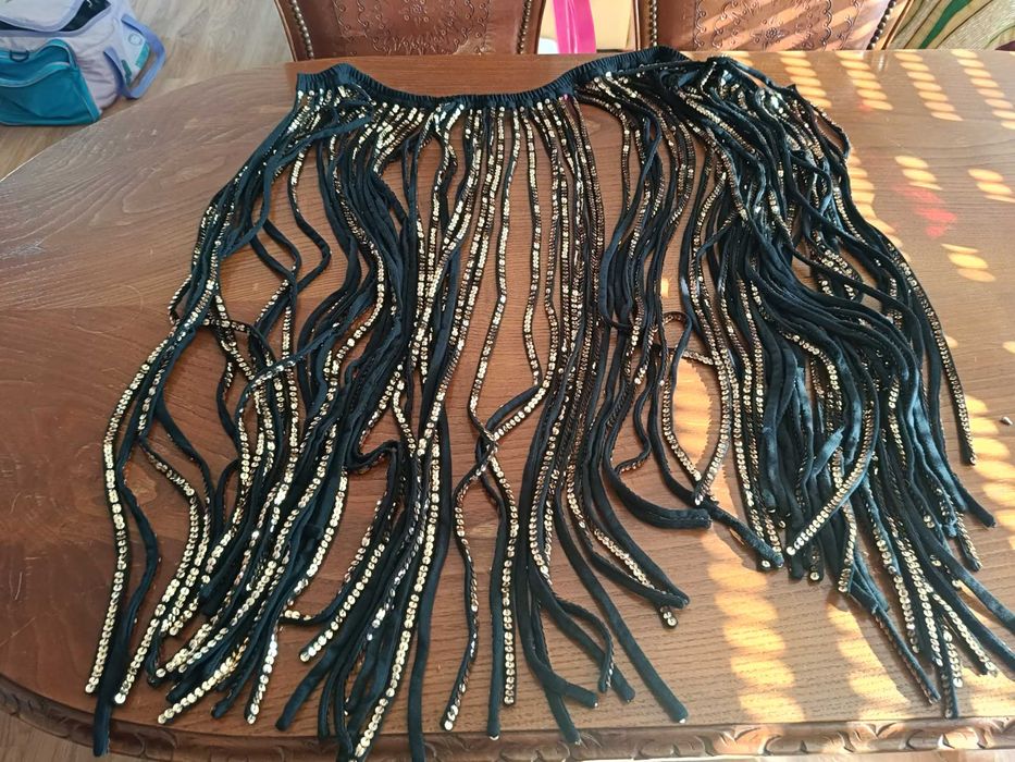 Cintos, saias e top de dança oriental