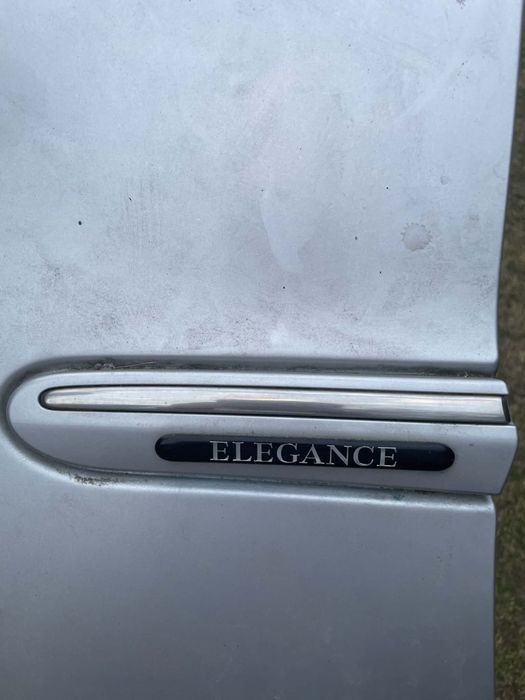 Błotnik przedni prawy Mercedes ELEGANCE srebrny