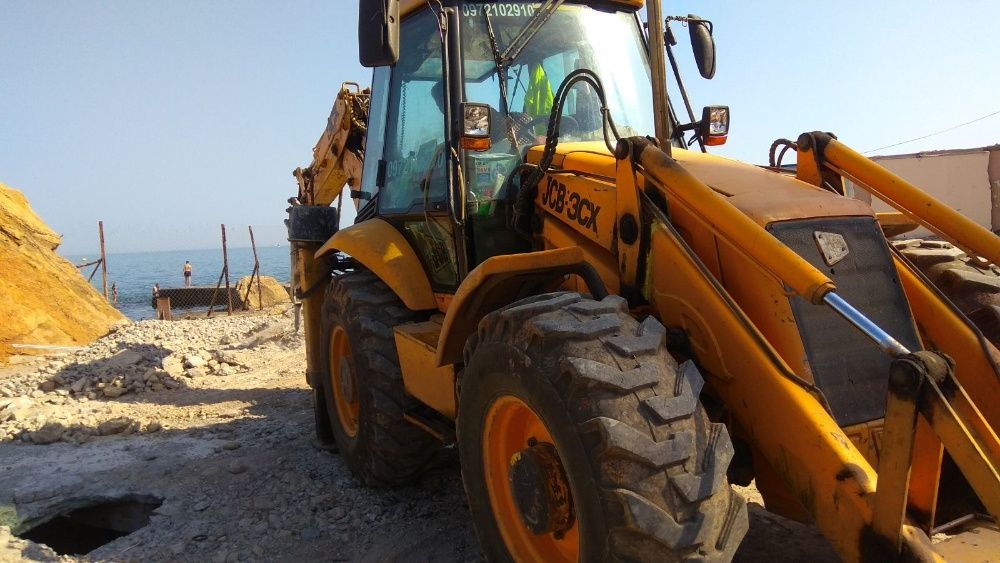 Аренда услуги экскаватора погрузчика JCB 3CX/4 CX