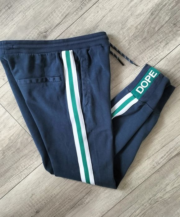 Reserved elastyczne joggery z lampasami dresy spodnie 158 164