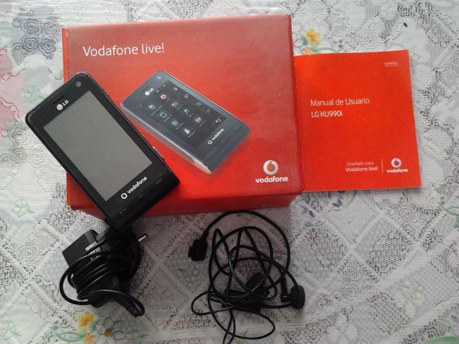 Телефон LG KU990i