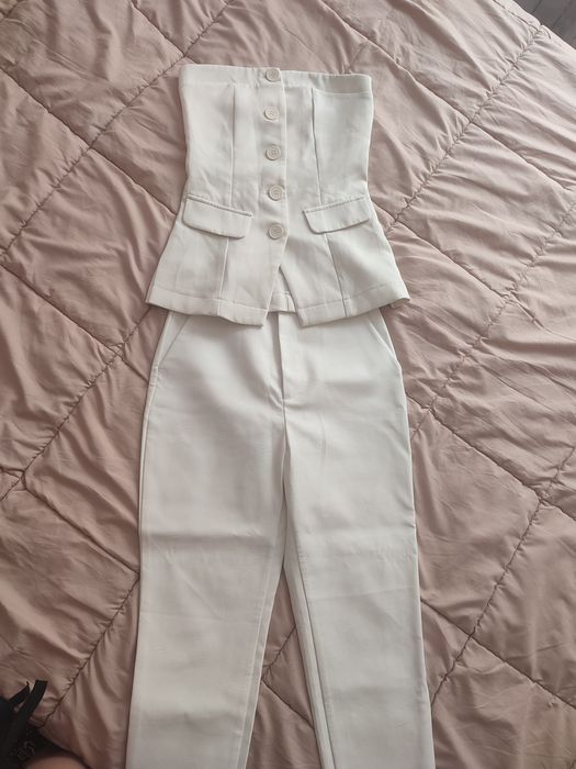 Продам костюм брючный