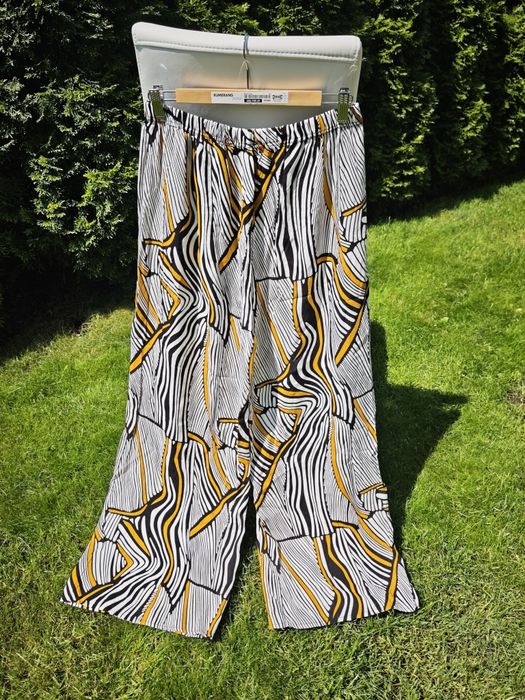 Proste szerokie spodnie r XL