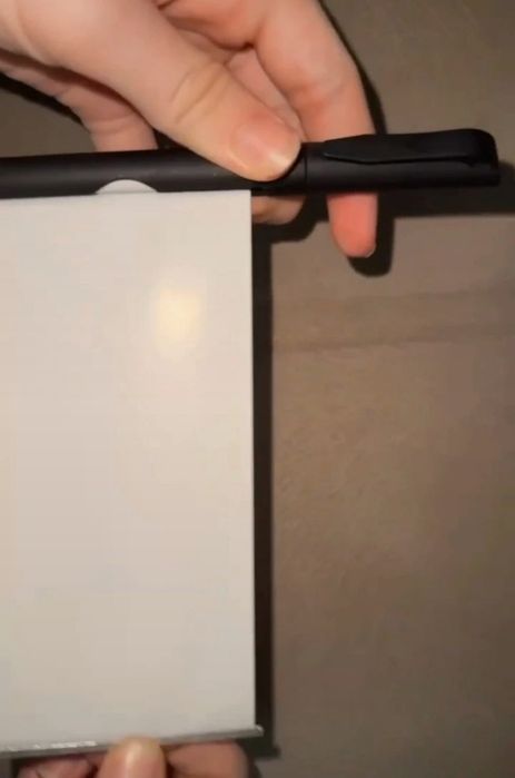 Caneta com tira de papel
