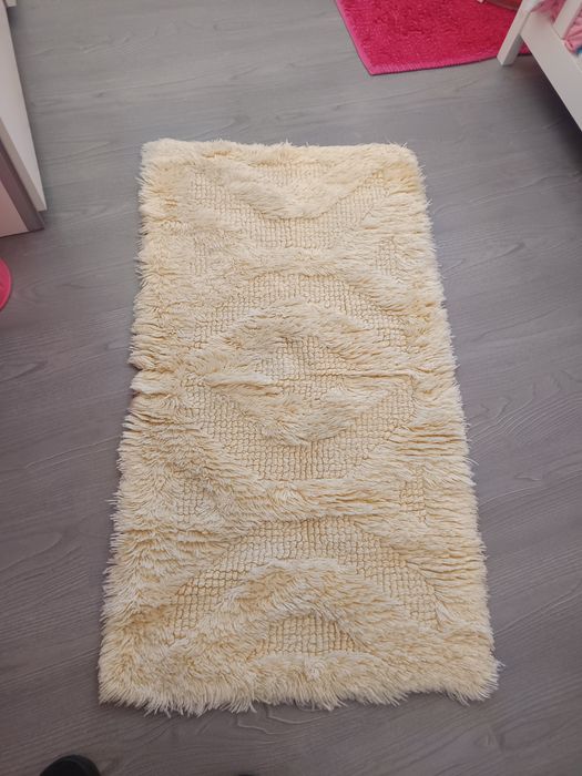 Conjunto de cortinados e tapetes