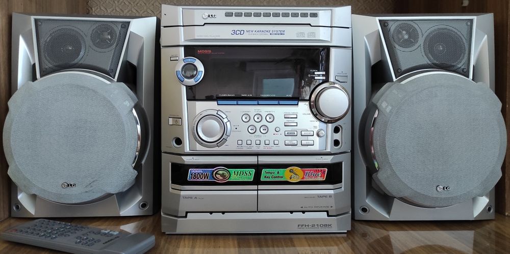 Музыкальный центр караоке LG музичний