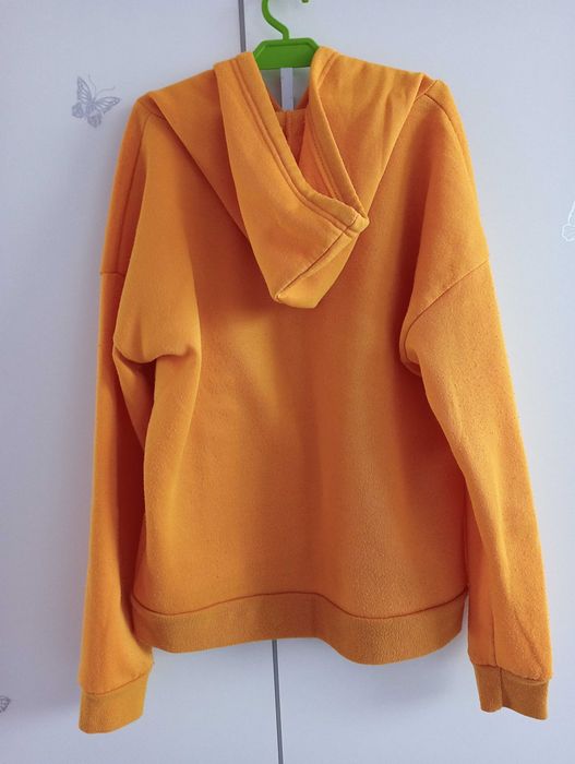 Bluza musztardowa z dłonią "s"