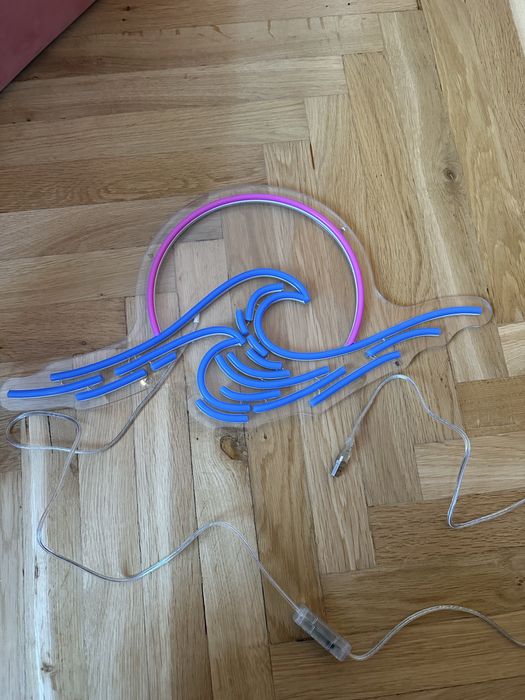 Neon morze zachód słońca fala