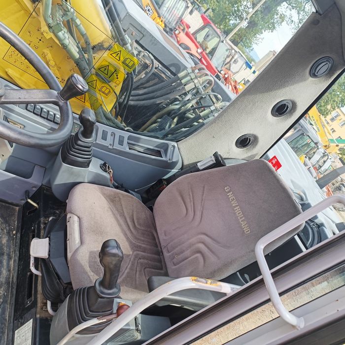 Maszyna budowlana koparka New Holland MH Plus  Ramie LONG