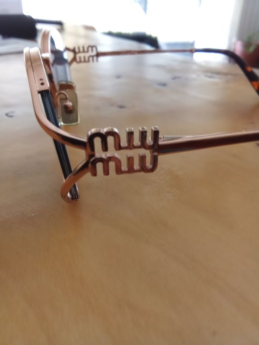 Óculos de sol MIU MIU