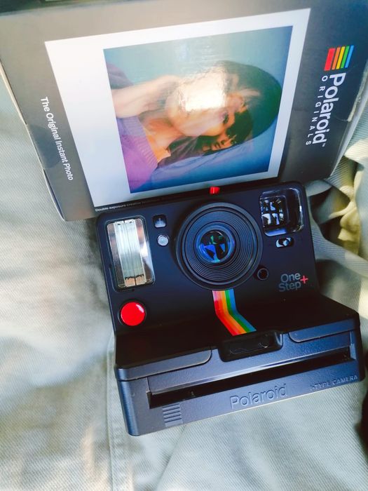 Polaroid Onestep + preta em ótimo estado.