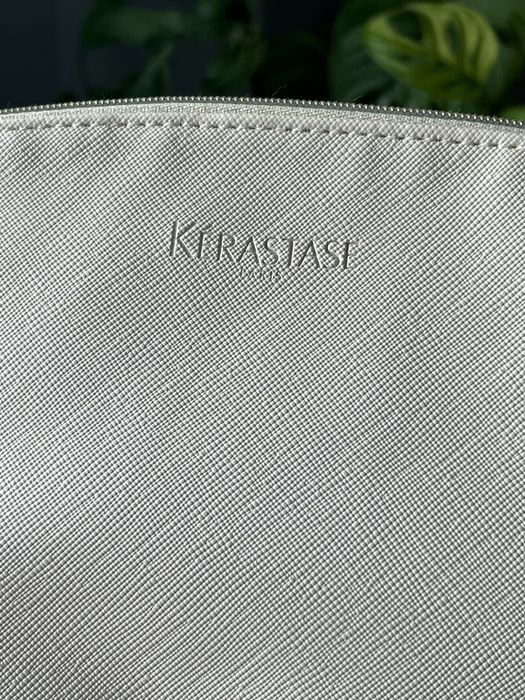 Biała kremowa kosmetyczka Kerastase